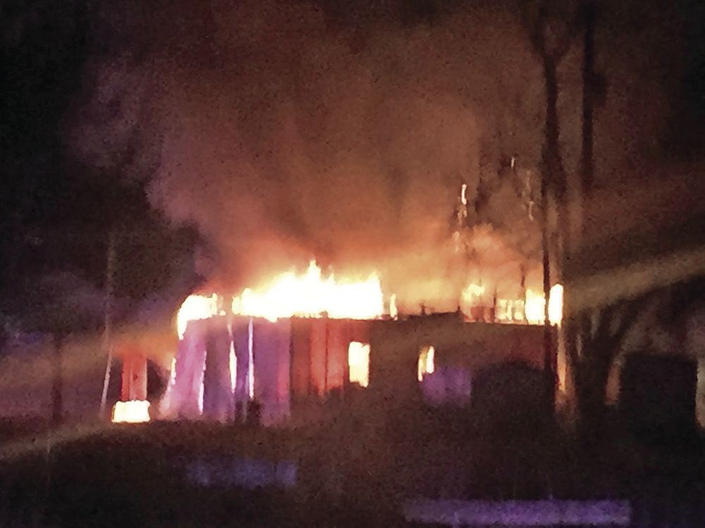 Garage and contents burned in early morning blaze